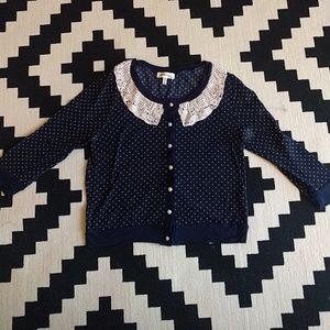 Navy blue polka dotted sweater with lace collar